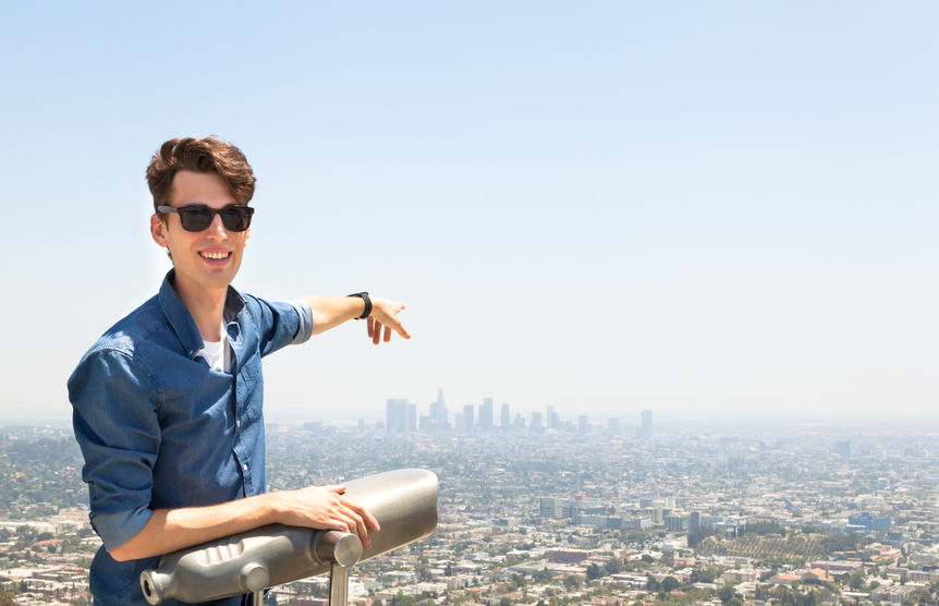 Dmitry Korikov as a tourist with a map at Griffith Observatory Park.
